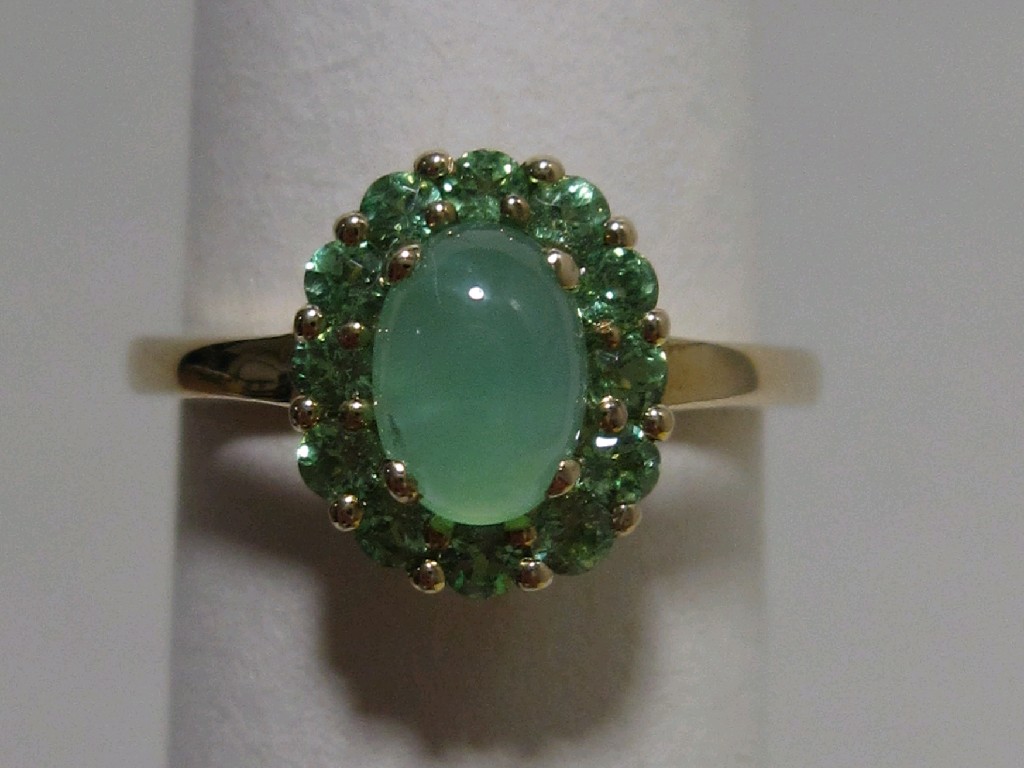 Appraisal: Nine carat gold green opal and peridot cluster ring