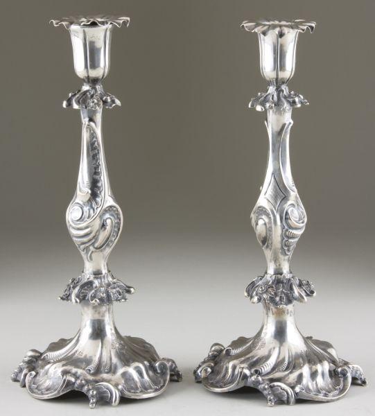 Appraisal: Pair of Silver Candlesticks circa both in an ornate Rococo