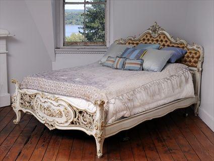 Appraisal: ITALIAN ROCOCO-STYLE CARVED PARCEL-GILT AND PAINTED BEDSTEAD The shaped scroll-and-rocaille