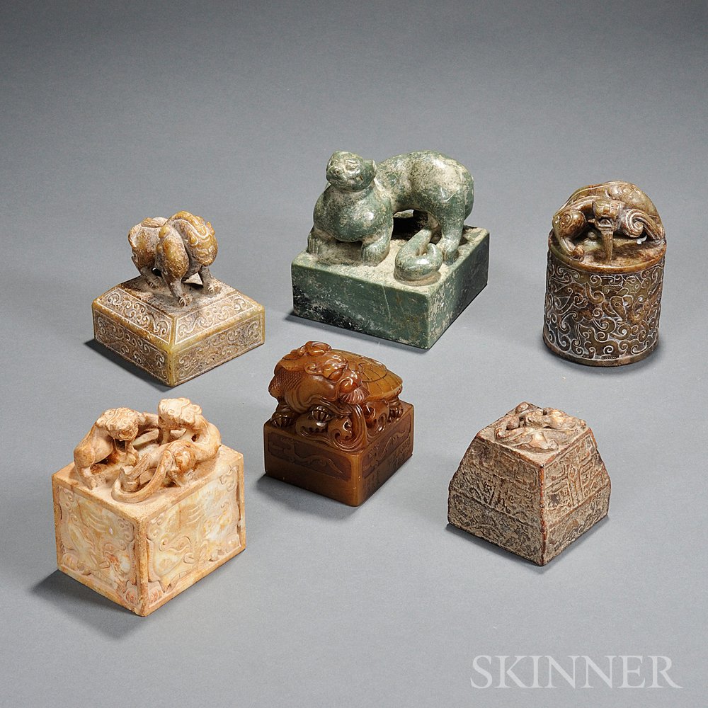 Appraisal: Six Stone Seals China a square brown stone seal with