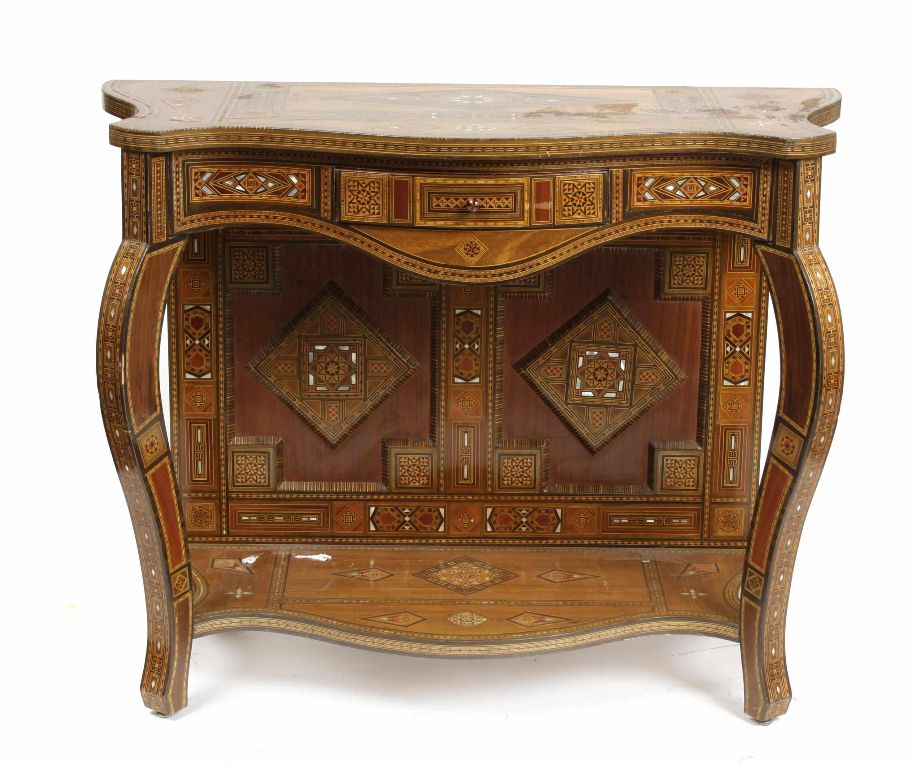 Appraisal: A Levantine shell inlaid carved hardwood console height in width