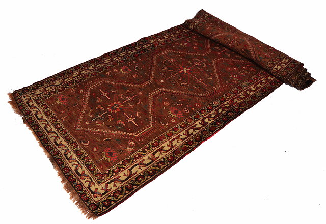 Appraisal: AN ANTIQUE PERSIAN HAMADAN RUNNER with a row on conjoined