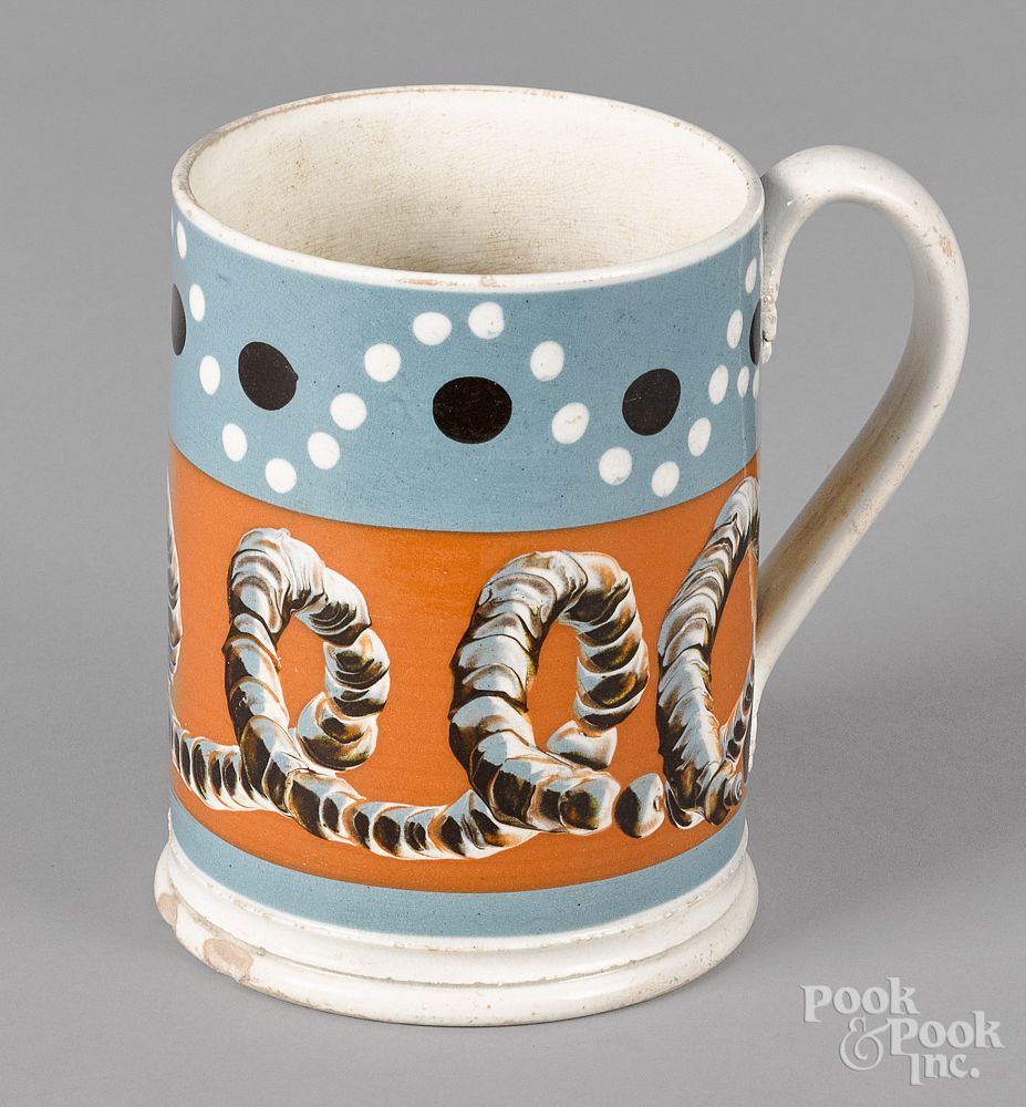 Appraisal: Mocha mug th c Mocha mug th c with earthworm