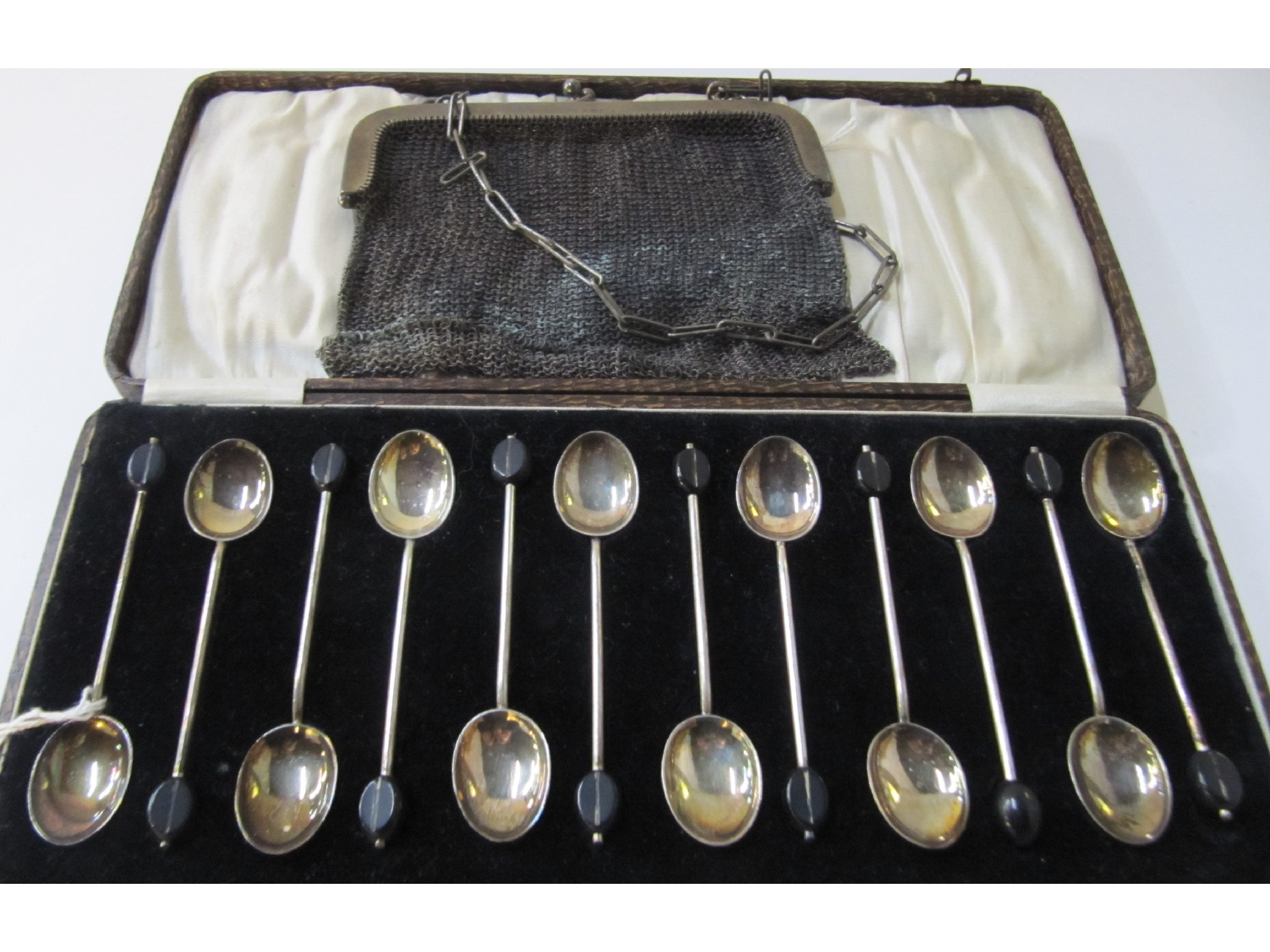 Appraisal: A lot comprising a cased set of twelve silver coffee