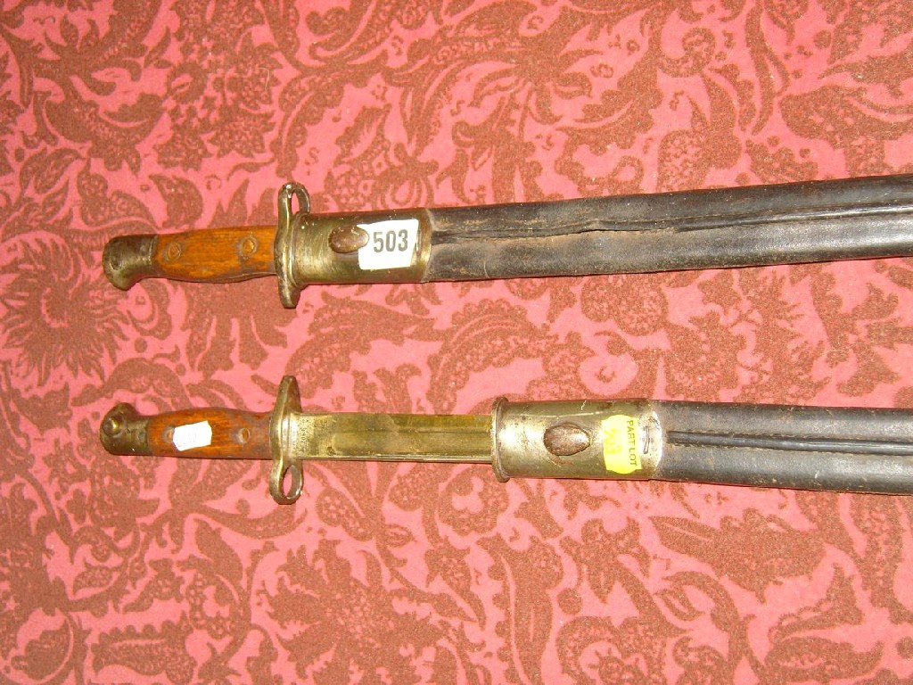 Appraisal: Two British pattern bayonets and scabbards