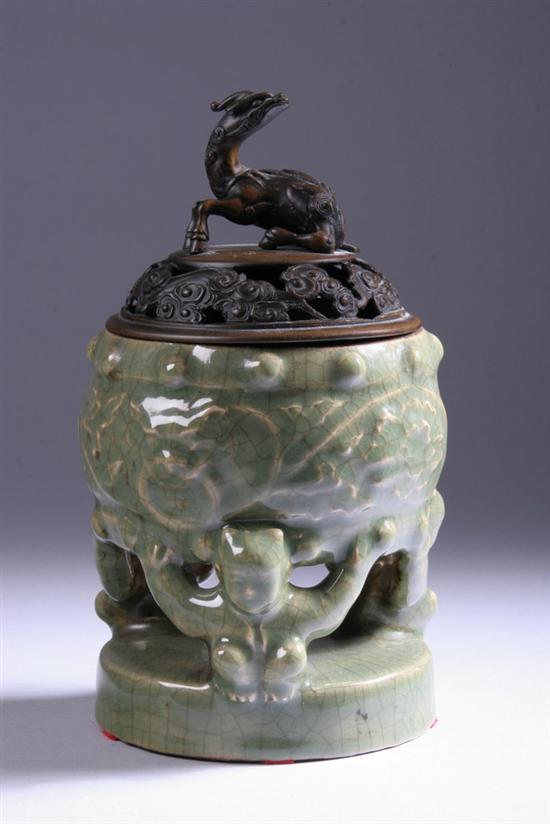 Appraisal: JAPANESE CELADON PORCELAIN CENSER AND BRONZE COVER Meiji period -