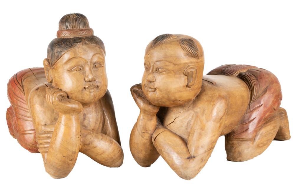 Appraisal: PAIR OF ASIAN CARVED PAINTED WOOD FIGURAL STOOLSCondition with separation