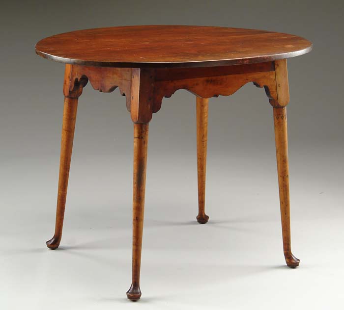 Appraisal: QUEEN ANNE COUNTRY OVAL TEA TABLE The oval top affixed