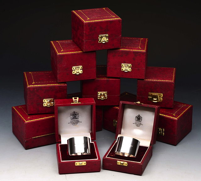 Appraisal: A COLLECTION OF TWELVE ASPREY CO SILVER NAPKIN RINGS of