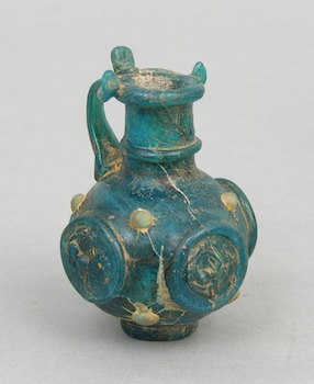 Appraisal: A Roman or Byzantine Miniature Blue Glass Ewer with Horse