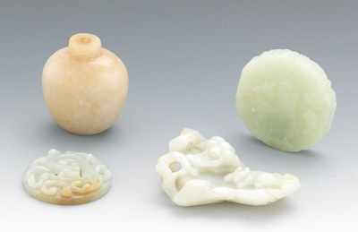 Appraisal: A Group of Four Jade Pieces Containing a carved jade