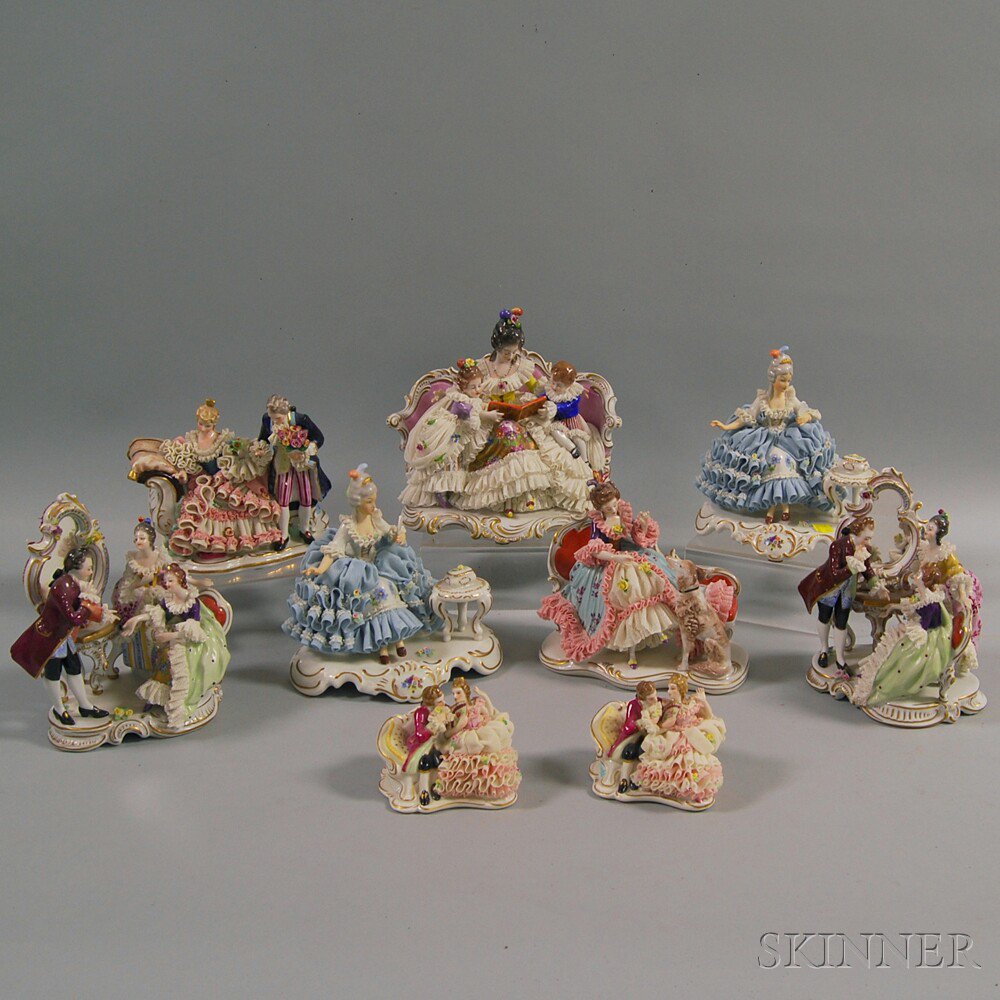 Appraisal: Nine Continental Porcelain Figural Groups th century three pairs and