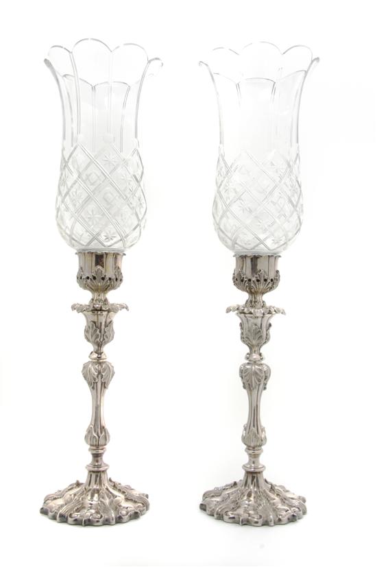 Appraisal: A Pair of Elkington Silverplate Candlesticks Height overall inches