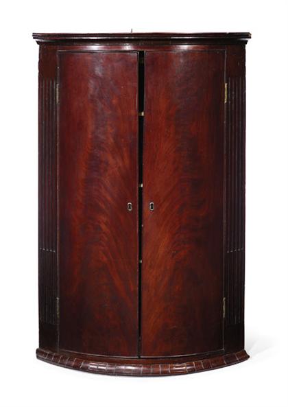 Appraisal: George III mahogany hanging corner cupboard later half of th