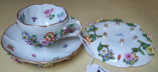 Appraisal: A Meissen tea cup and saucer and one other saucer