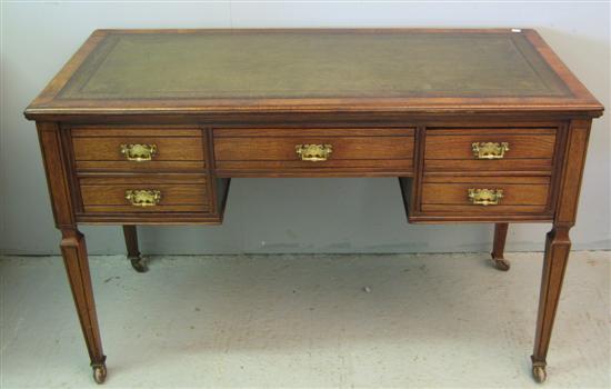 Appraisal: th Century mahogany kneehole writng desk with tooled leather top