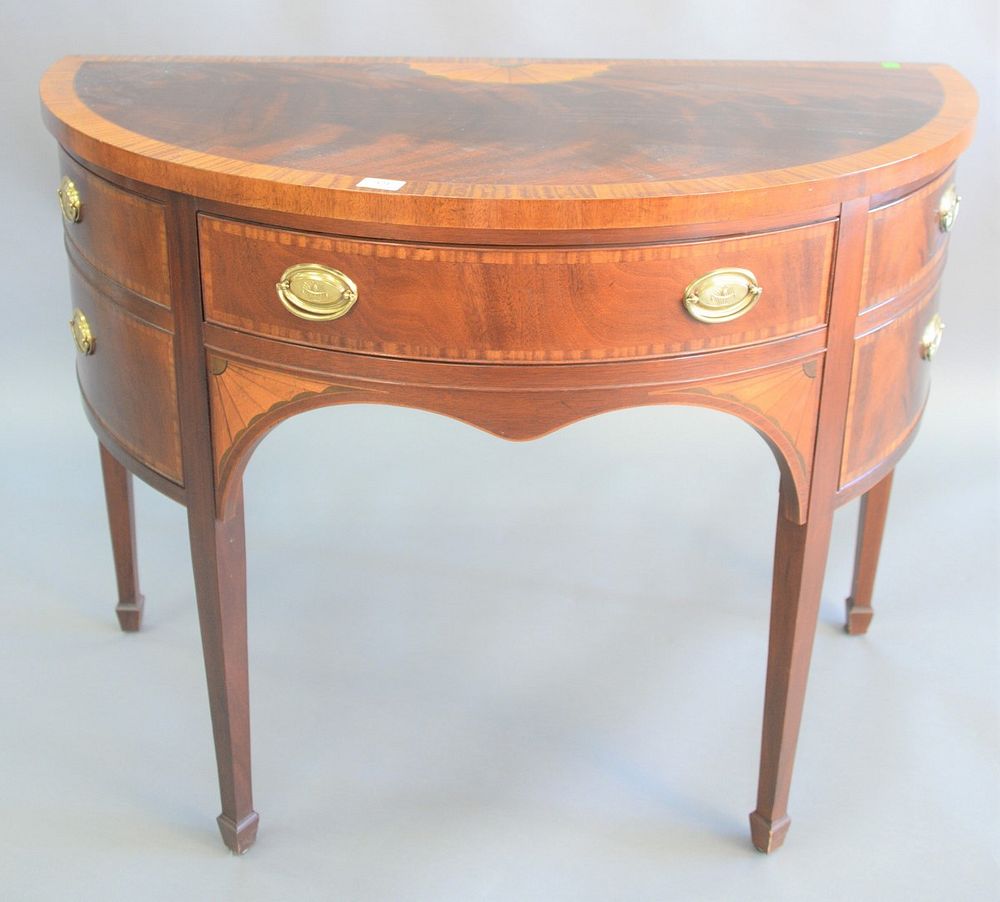 Appraisal: Baker mahogany half round server with inlaid top over two