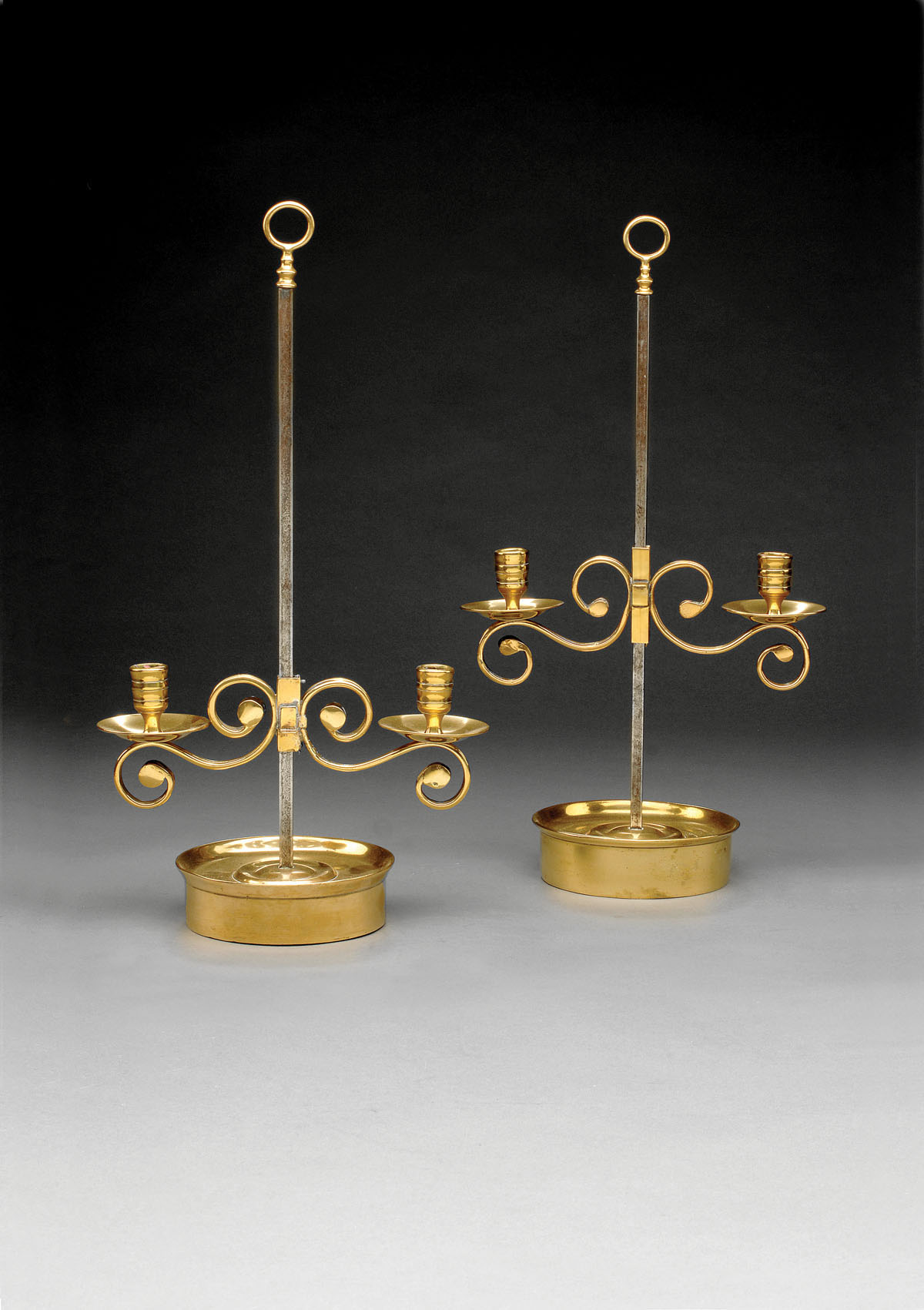 Appraisal: PAIR OF ENGLISH BRASS TWO LIGHT ADJUSTABLE TABLE TOP CANDLE