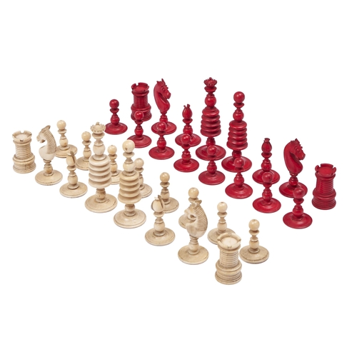 Appraisal: A Victorian bone chess set stained red and natural kings