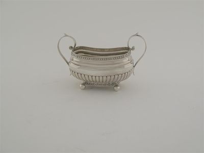 Appraisal: A George III part fluted sugar basin on ball feet