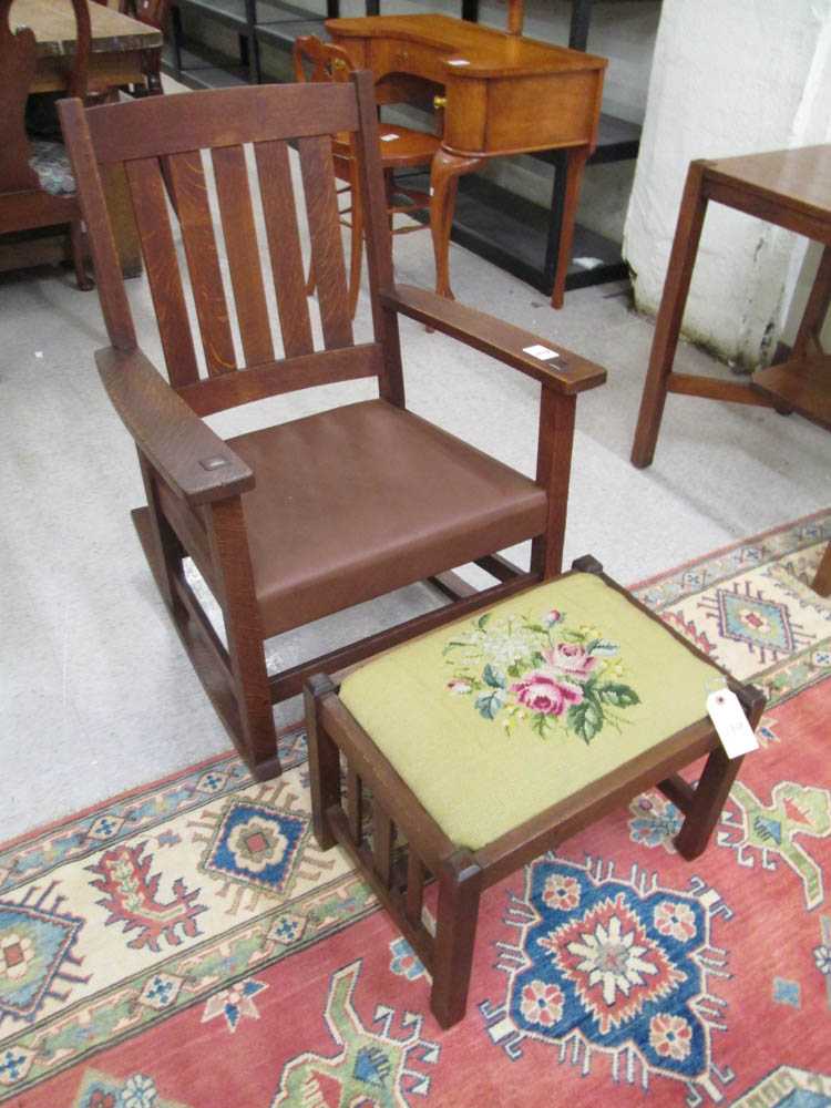 Appraisal: MISSION OAK ROCKER AND FOOTSTOOL Gustav Stickley design American early