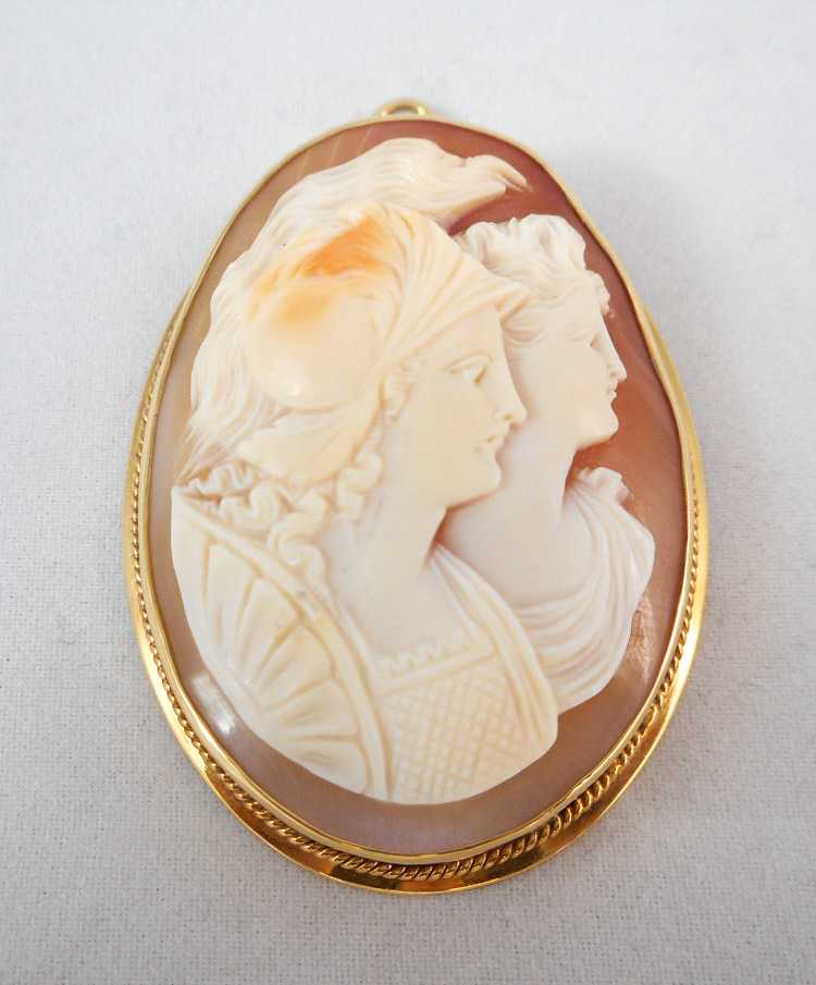 Appraisal: VICTORIAN DOUBLE PORTRAIT CAMEO PENDANT with an oval relief carved