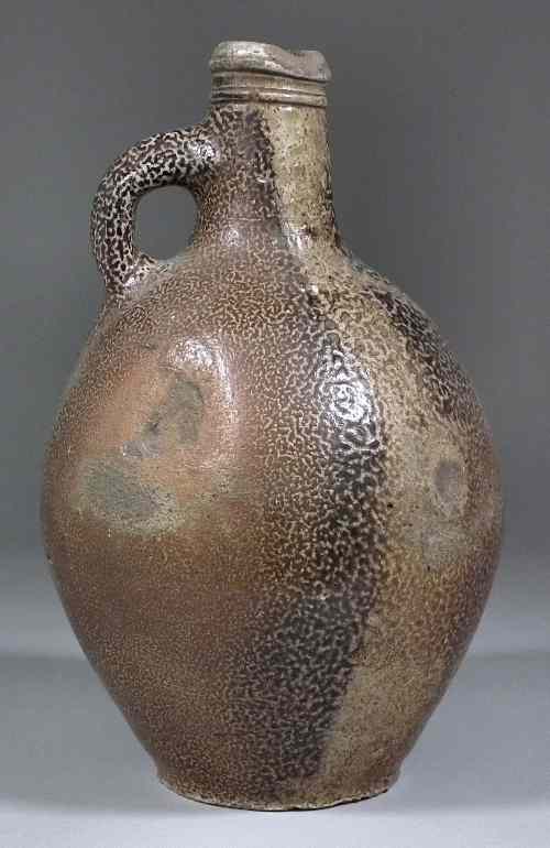 Appraisal: A th Century Continental salt glazed stoneware bulbous wine jar