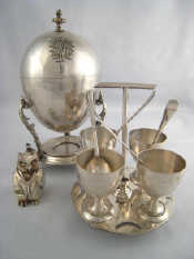 Appraisal: Two silver plated items being a Victorian four egg coddler