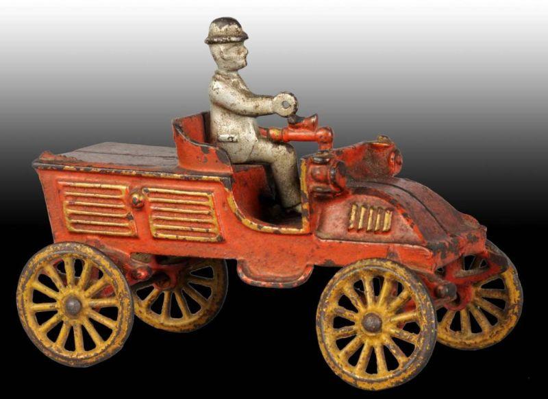 Appraisal: Cast Iron Kenton Early Runabout Toy Description Red with gold