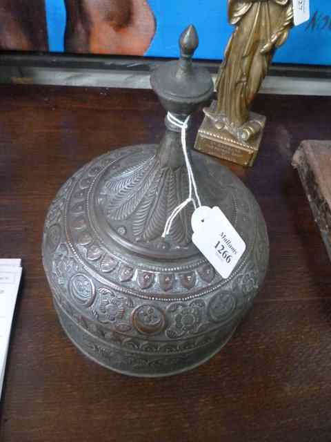 Appraisal: AN ISLAMIC SILVER PLATED ON COPPER lidded vessel domed top