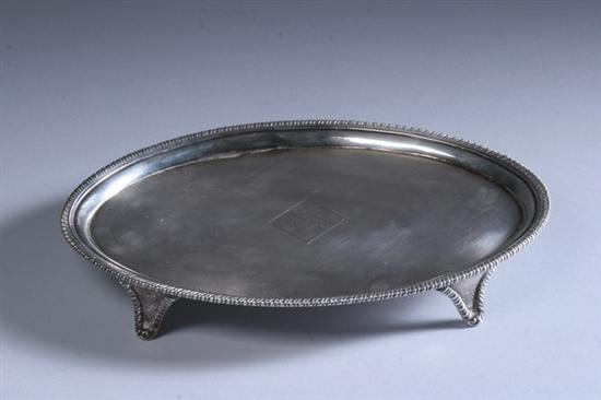 Appraisal: GEORGE III SILVER FOOTED TEAPOT STAND Timothy Renou London Oval