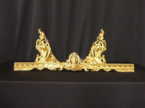 Appraisal: LOUIS XV STYLE BRASS FIRE FENDER In three sections the