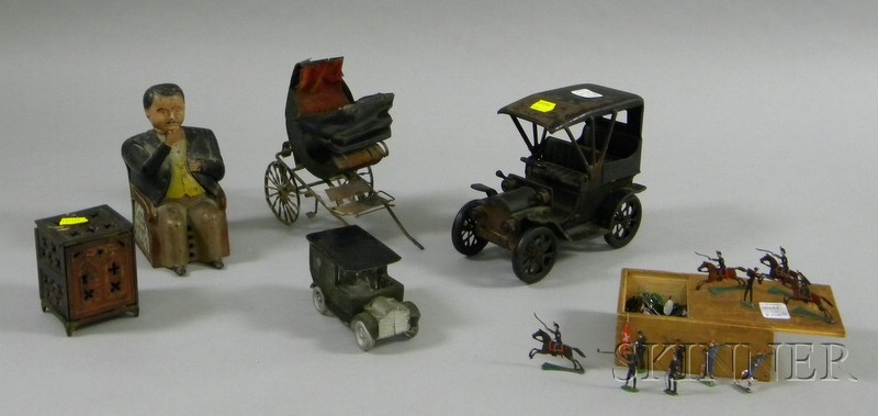 Appraisal: Group of Painted Metal Banks and Toys a painted cast