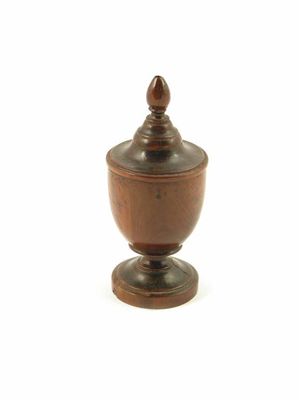 Appraisal: An th century turned yew wood spice castor of vase