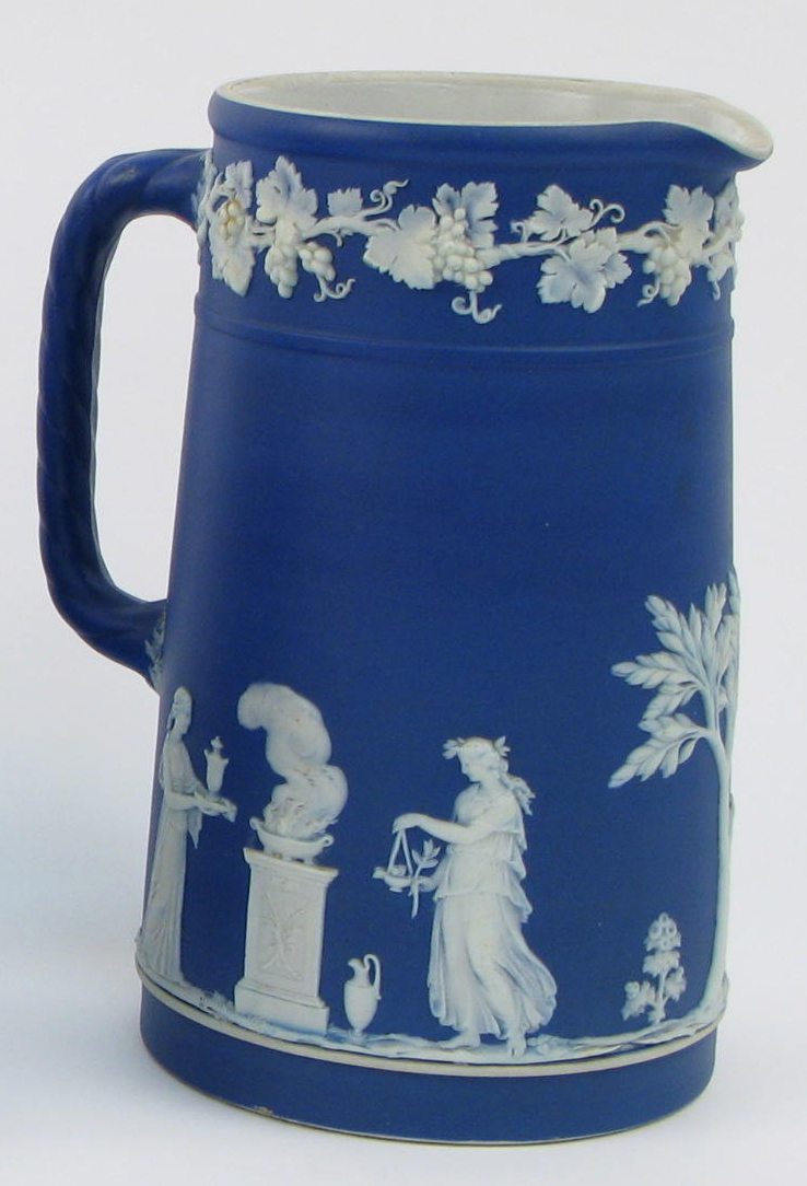 Appraisal: AN ENGLISH VICTORIAN WEDGWOOD BLUE JASPERWARE PITCHER having white Grecian