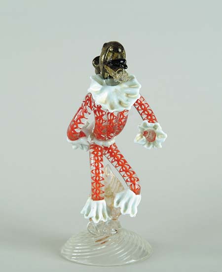 Appraisal: ITALIAN COLORED GLASS DANCING JESTER FIGURINE Red spiral twist within