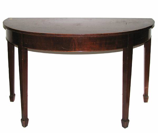 Appraisal: A George III style mahogany demilune console height in width