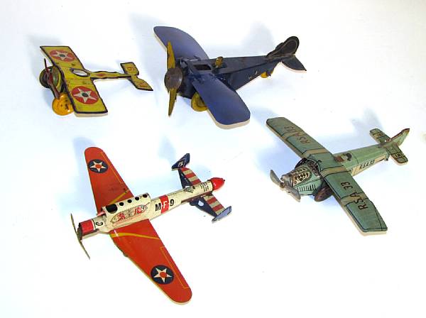 Appraisal: Grouping of Lithographed airplanes Includes a collapsible winged plane by