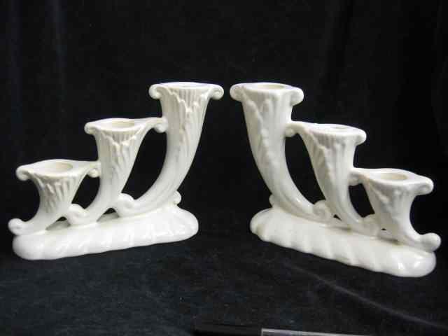 Appraisal: Pair of Art Pottery Candelabra triple sconce cornucopia style ''