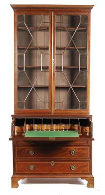 Appraisal: A mahogany secretaire bookcase with a dentil moulded cornice above