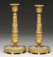 Appraisal: FINE PAIR OF CONTINENTAL CAST BRASS CANDLESTICKS Ornate tapered sticks