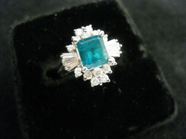 Appraisal: Emerald Diamond Ring fine emerald cut gem weighing carat surrounded