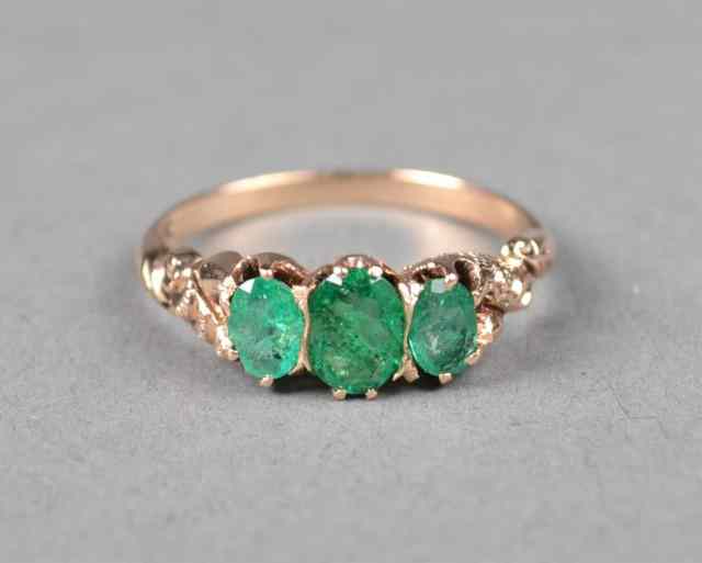 Appraisal: A kt Gold And Emerald RingThree oval prong set emerald