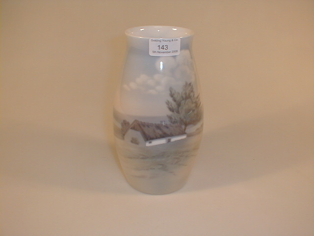 Appraisal: A Royal Copenhagen baluster vase with rural scene decoration