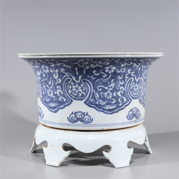 Appraisal: Chinese blue and white porcelain planter with floral designs to