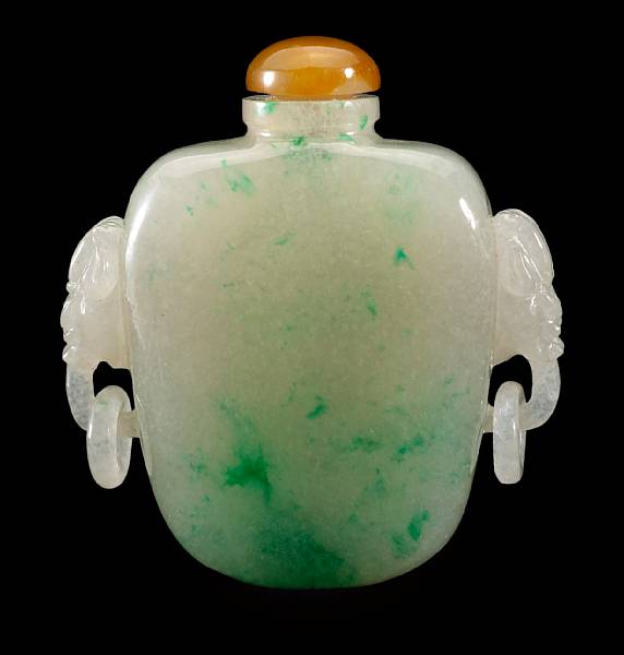 Appraisal: A jadeite snuff bottle Of flattened baluster form carved to