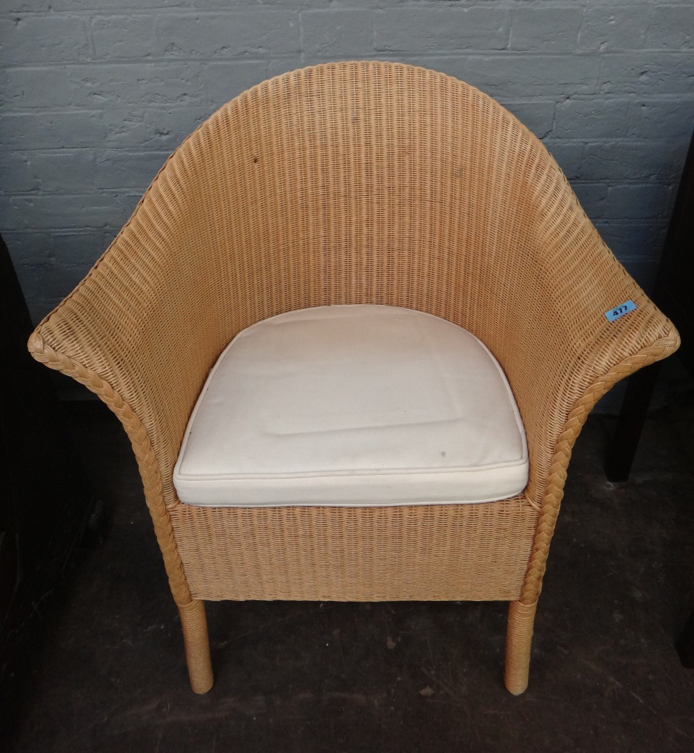 Appraisal: A Lloyd Loom chair by Eastward and a gold sprayed