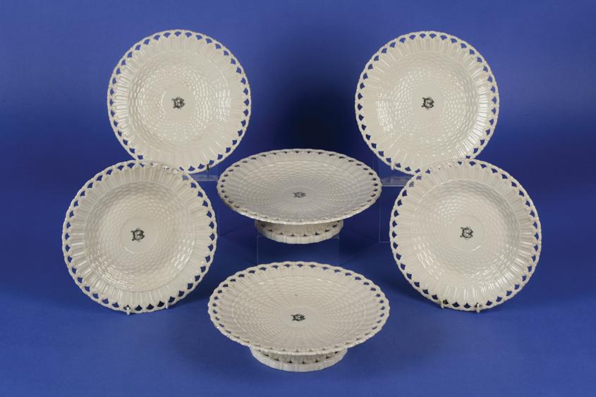 Appraisal: A BELLEEK BASKET WEAVE PART DESSERT SERVICE with pierced borders