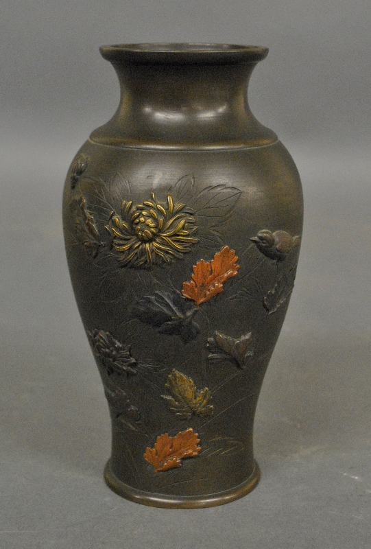 Appraisal: - Asian bronze vase with relief decoration of flowers and