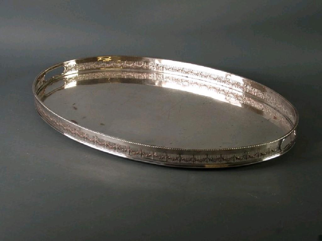 Appraisal: AN ELECTROPLATED ON COPPER OVAL GALLERY TEA TRAY with two